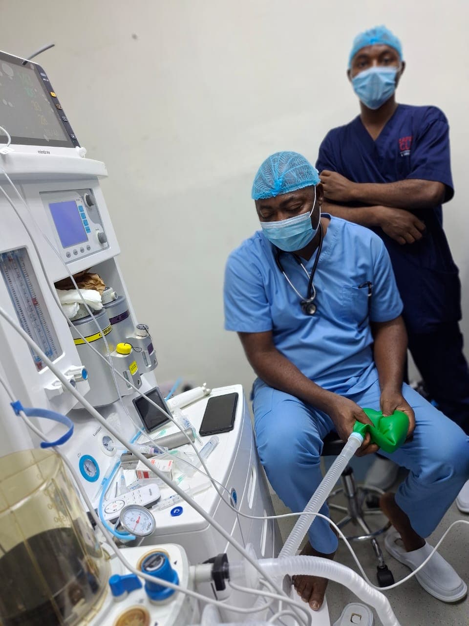 Critical care specialist with ventilation and monitoring equipment